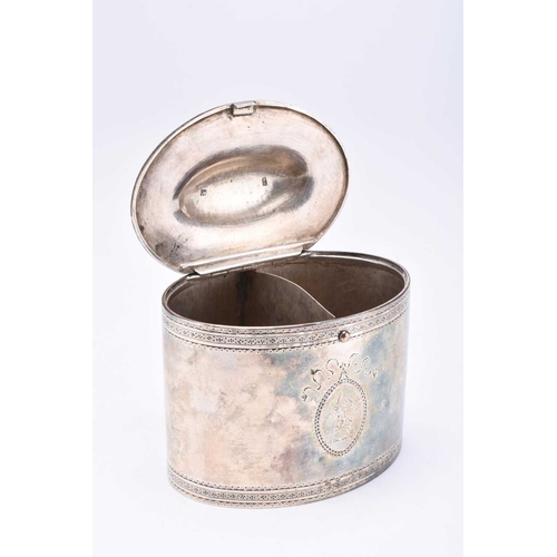 67 - A George III silver tea caddy, William Vincent, London 1795, of oval form with bright cut engraved d... 