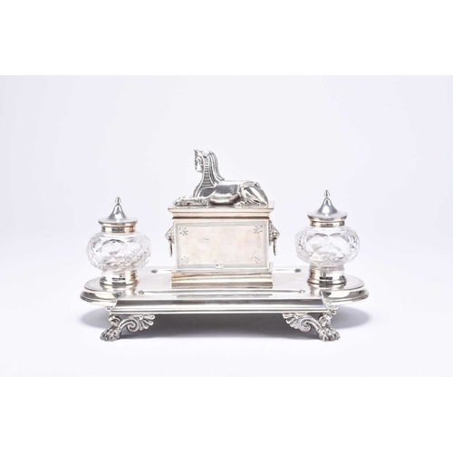 76 - A Victorian Egyptian revival silver desk stand, Horace Woodward, Birmingham 1871, of shaped rectangu... 