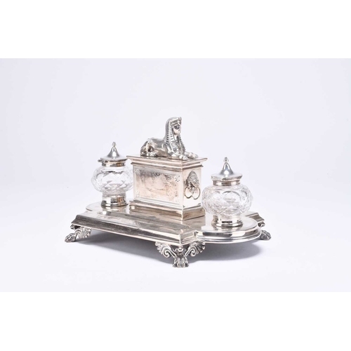 76 - A Victorian Egyptian revival silver desk stand, Horace Woodward, Birmingham 1871, of shaped rectangu... 