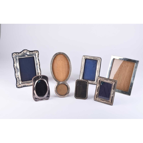 88 - A collection of eight silver mounted photograph frames, comprising; an early 20th century plain poli... 