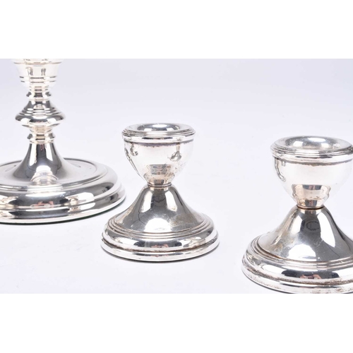 9 - A pairs of silver mounted candlesticks, D J Silver Repairs, London 1989, each with knopped stem and ... 