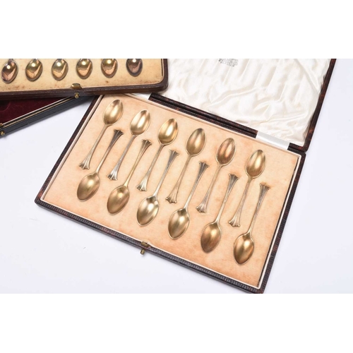 93 - A cased set of twelve silver gilt coffee spoons, Josiah Williams & Co, London 1925 & 1926, together ... 