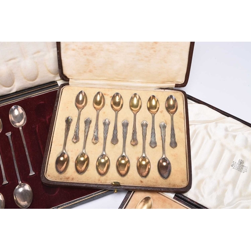 93 - A cased set of twelve silver gilt coffee spoons, Josiah Williams & Co, London 1925 & 1926, together ... 