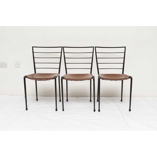 116 - Robert Heal for Staples, six Ladderax dining chairs With black steel frames and tan leather slung se... 