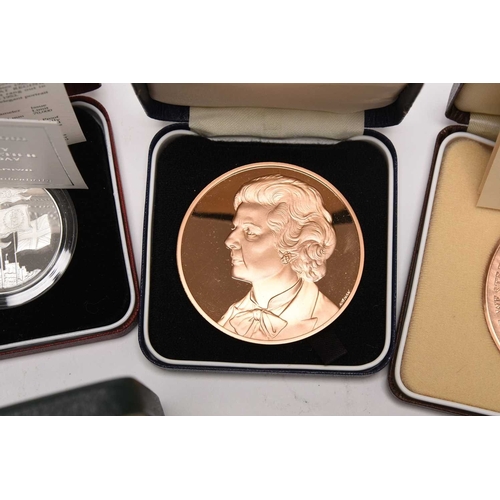 257 - A collection of coins, comprising; three silver proof five pounds commemorative coins dated 1990 x 2... 