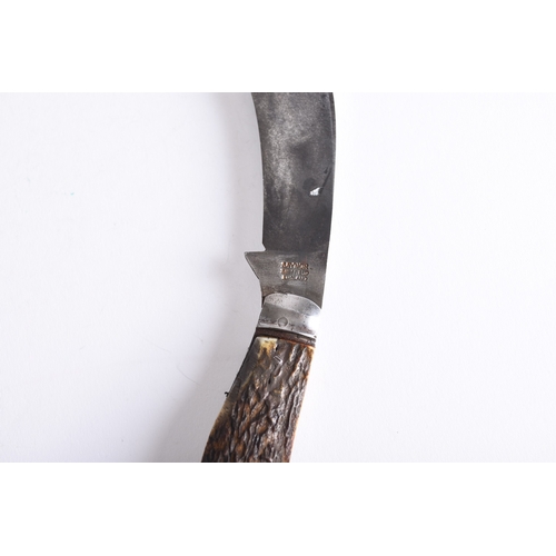 303 - A Saynor (Sheffield) folding pruning knife with horn grips, blade length 8.5cm, overall length 20cm;... 