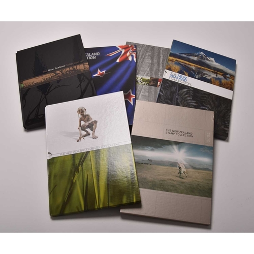 228 - A large collection of New Zealand stamps and covers etc. 5 albums of mint and used stamps, some mini... 