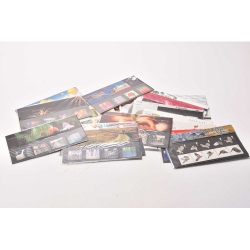 275 - An accumulation of GB Presentation Packs with a face value of £190 approx. Plus a few First Day Cove... 