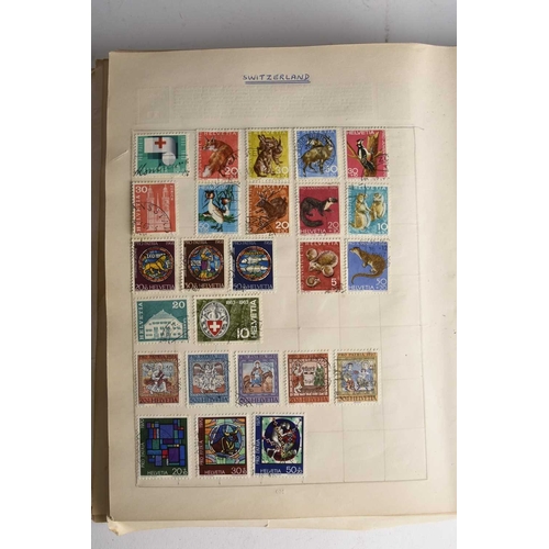 300 - World stamp collection in 2 albums which contain useful pickings plus Greenland Year Packs (1979, 19... 