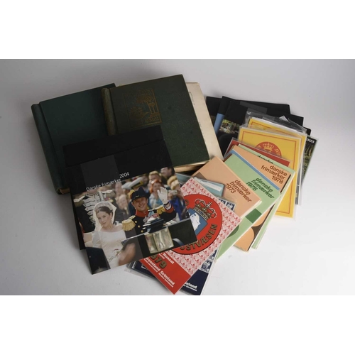 300 - World stamp collection in 2 albums which contain useful pickings plus Greenland Year Packs (1979, 19... 