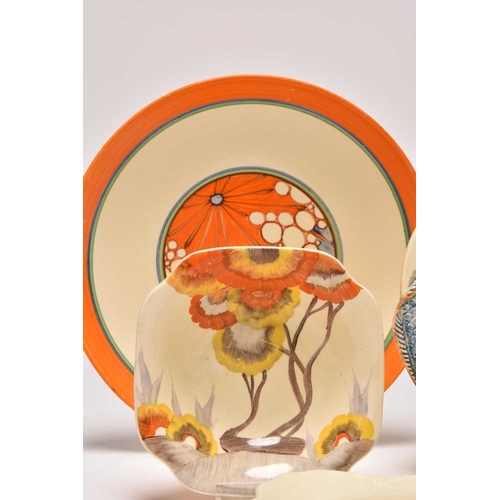 144 - A collection of Clarice Cliff Art Deco ceramics, comprising: A 'Ravel' Odilon circular tureen and co... 