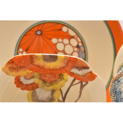 144 - A collection of Clarice Cliff Art Deco ceramics, comprising: A 'Ravel' Odilon circular tureen and co... 