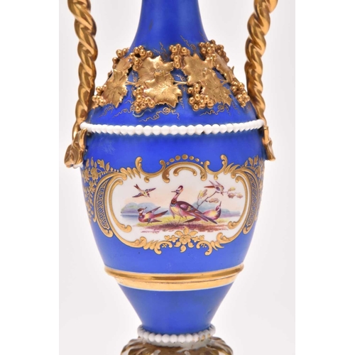 149 - A Chamberlain's (Worcester) ornamental twin-handled vase, circa 1820, the matt blue ground with appl... 