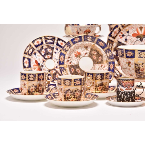 163 - A varied collection of assorted English imari tea and coffeewares, comprising a Wade double preserve... 