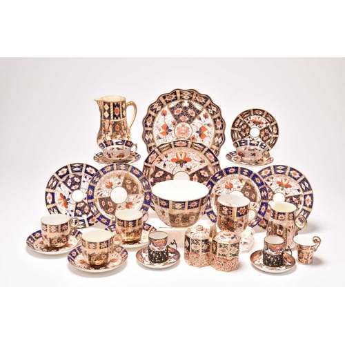 163 - A varied collection of assorted English imari tea and coffeewares, comprising a Wade double preserve... 