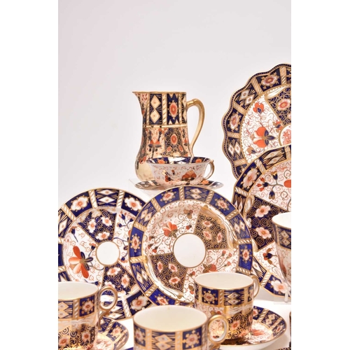163 - A varied collection of assorted English imari tea and coffeewares, comprising a Wade double preserve... 