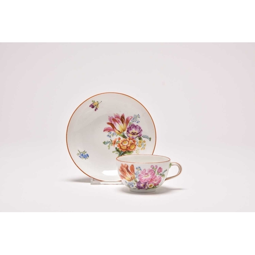 181 - A Meissen teacup and saucer, Marcolini period (1774-1814), painted with floral bouquets in colourful... 