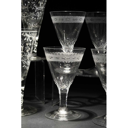 188 - A set of six goblets, 20th century, decorated in white enamel with ribbons, vases, angel's heads and... 