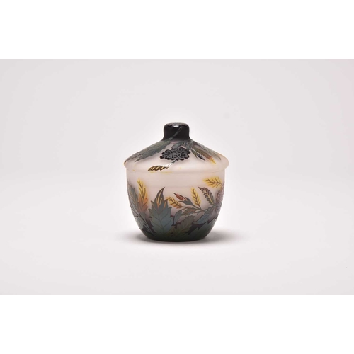 195 - A contemporary Ryszard Ramski cameo glass bowl and cover, cased in purple and brown over mottled cle... 