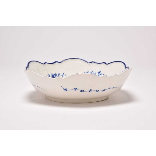 42 - A rare Caughley 'Bright Sprigs' salad bowl or junket dish, circa 1782-92, painted in underglaze blue... 