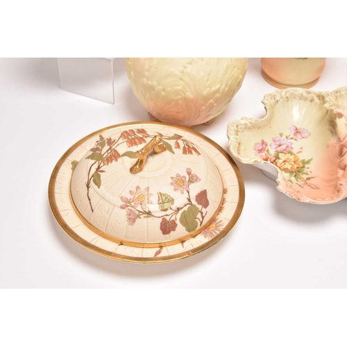 93 - A collection of Royal Worcester blush ivory, typically decorated with flowers, late 19th/early 20th ... 