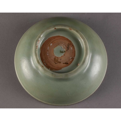 201 - A Chinese Longquan brush washer, Ming Dynasty Of shallow round form, covered in a celadon green glaz... 