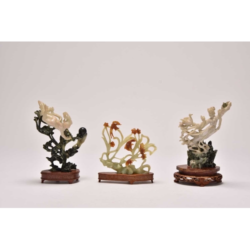 237 - A group of three Chinese jadeite figures including Moon Goddesses
20th century
Comprising a pair, mo... 