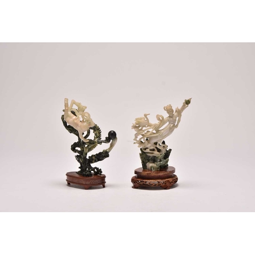 237 - A group of three Chinese jadeite figures including Moon Goddesses
20th century
Comprising a pair, mo... 