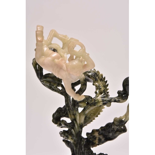 237 - A group of three Chinese jadeite figures including Moon Goddesses
20th century
Comprising a pair, mo... 