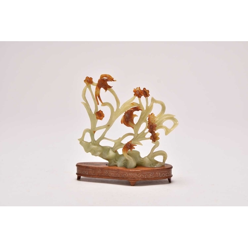 237 - A group of three Chinese jadeite figures including Moon Goddesses
20th century
Comprising a pair, mo... 