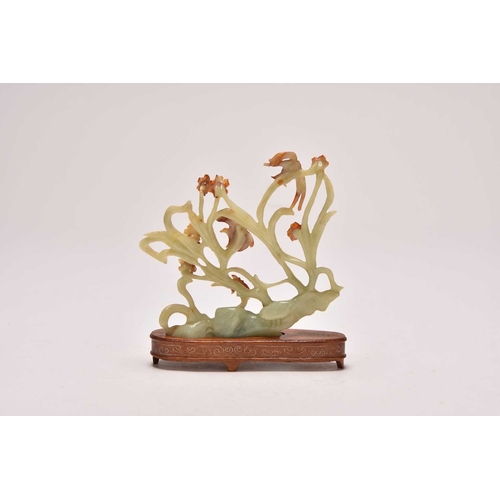 237 - A group of three Chinese jadeite figures including Moon Goddesses
20th century
Comprising a pair, mo... 