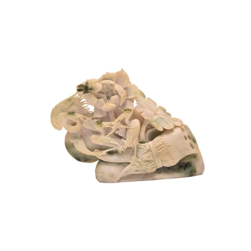 240 - A group of Chinese jade and hardstone carvings Qing Dynasty and later Including a belt buckle carved... 