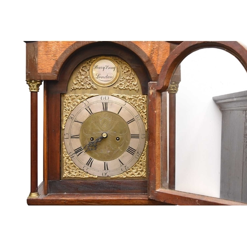 287 - A 19th century oak brass dial longcase clock The dial signed Henry Long, London The hood with swan-n... 