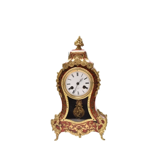 311 - A late 19th century French boulle mantel clock The dial signed Martin Baskett & Cie, Paris The waist... 