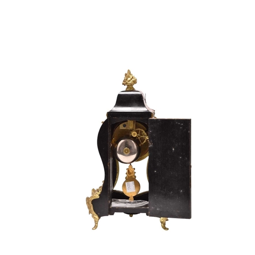 311 - A late 19th century French boulle mantel clock The dial signed Martin Baskett & Cie, Paris The waist... 