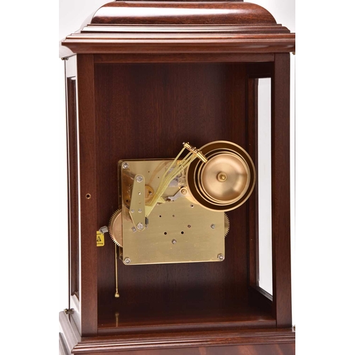 314 - A Franze Hermle inlaid mahogany musical bracket clock The case with ogee top, the door with inlaid s... 