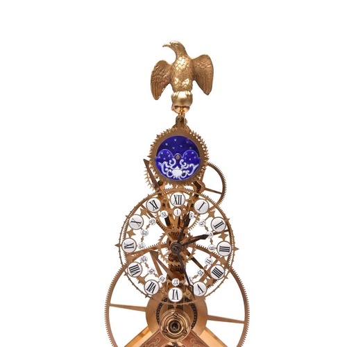 319 - A 20th century gilt brass and enamel skeleton clock The etched frame surmounted by a gilt metal eagl... 