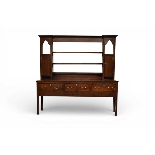 351 - An 18th century oak dresser and rack, Shropshire The associated open rack with cavetto cornice above... 