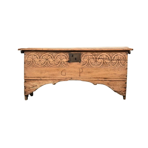 353 - A 17th century carved elm six plank coffer The moulded top with tooled frieze, the front with guillo... 