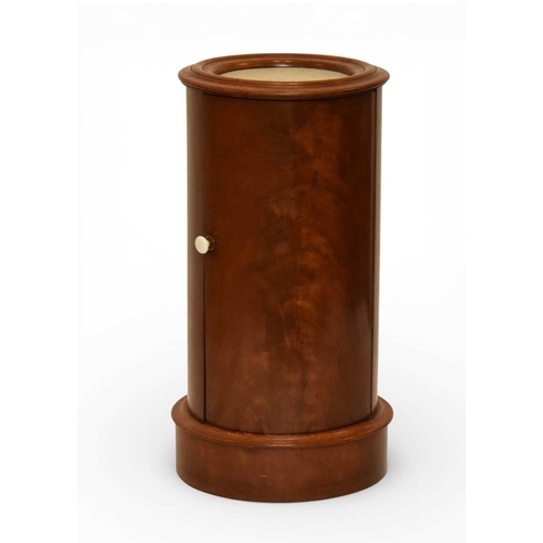 366 - A George III mahogany marble inset drum pot cupboard The molded top over a single door opening onto ... 