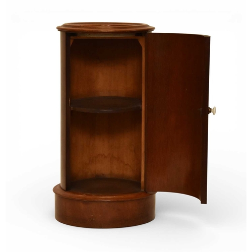 366 - A George III mahogany marble inset drum pot cupboard The molded top over a single door opening onto ... 