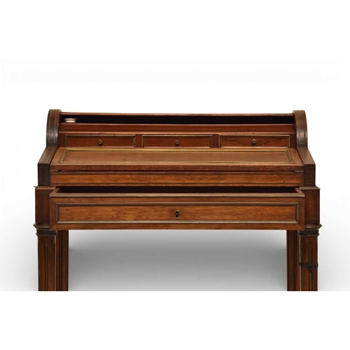 385 - A French brass inlaid mahogany bonheur de jour The sloping hinged top with brass moulding, opening t... 