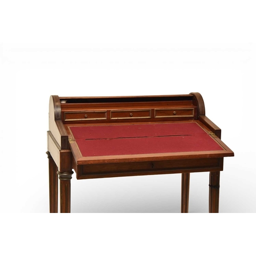 385 - A French brass inlaid mahogany bonheur de jour The sloping hinged top with brass moulding, opening t... 