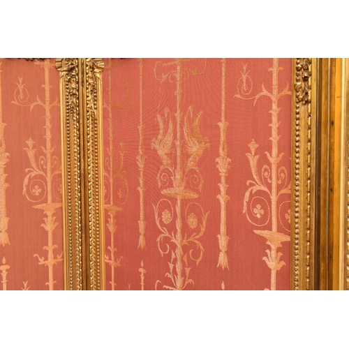 387 - A French giltwood Empire style three-fold room screen Late 19th century, each panel with moulded fra... 