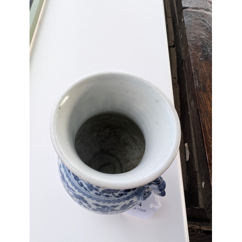 214 - A Chinese blue and white porcelain Hu-form vase 18th century, probably Qianlong Of ovoid form with t... 