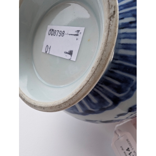 214 - A Chinese blue and white porcelain Hu-form vase 18th century, probably Qianlong Of ovoid form with t... 