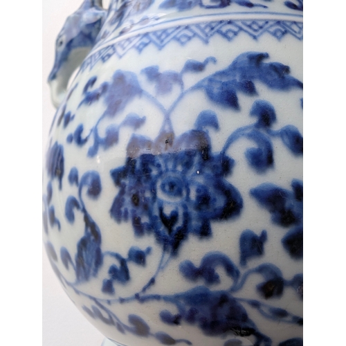214 - A Chinese blue and white porcelain Hu-form vase 18th century, probably Qianlong Of ovoid form with t... 