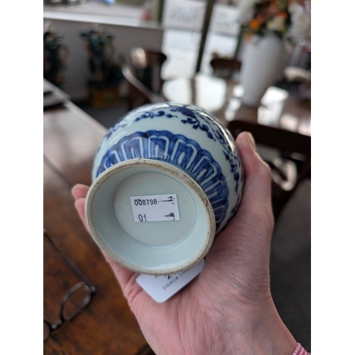 214 - A Chinese blue and white porcelain Hu-form vase 18th century, probably Qianlong Of ovoid form with t... 