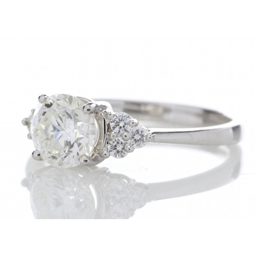 11 - A wonderfully handcrafted diamond engagement ring with a lively natural round brilliant cut diamond ... 