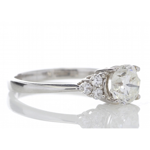 11 - A wonderfully handcrafted diamond engagement ring with a lively natural round brilliant cut diamond ... 